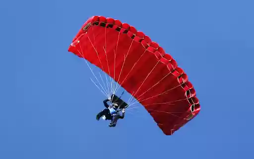 Red parachute in the blue sky. from Chrome web store to be run with OffiDocs Chromium online Red parachute in the blue sky. from Chrome web store to be run with OffiDocs Chromium online